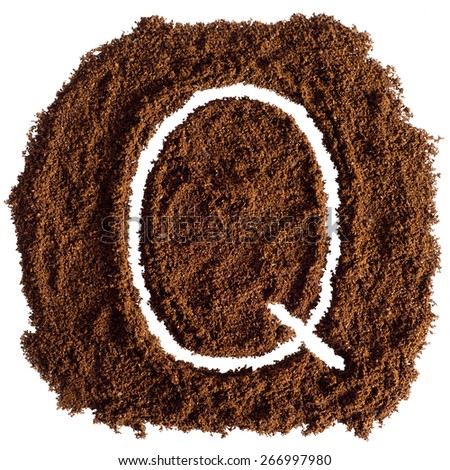 The letter Q written on-ground coffee