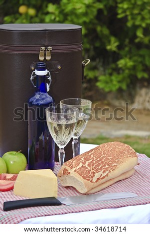 Picnic with wine in lemon tree orchard