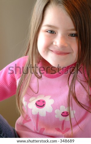 Cute little girl with a silly smile