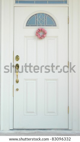 White door with pink flower