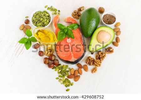 set of food with healthyl fats and omega-3, laid out in the shape of a heart. Health concept