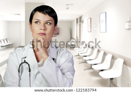 Thinking medical doctor thinking looking up smiling, Medical woman in the office, diagnosis
