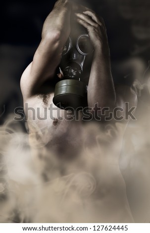 Suffering, naked man with gas mask, retro