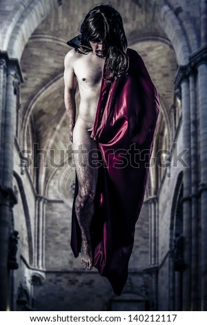 Nude magician levitating inside a Gothic cathedral