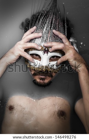 Man with mask, melancholy and suicide, sadness and depression concept