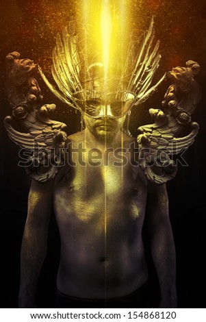 Victory, warrior or ancient god with golden mask and sword greatsword