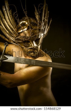 Sword, warrior or ancient god with golden mask and sword greatsword