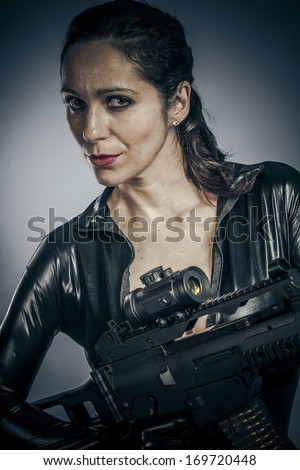Criminal, Sexy girl military woman posing with guns.