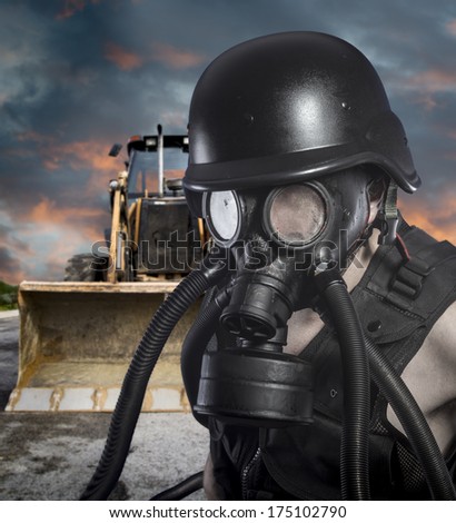 Pollution.Environmental disaster. Post apocalyptic survivor in gas mask