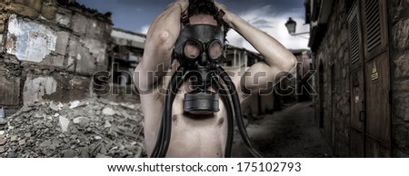 Toxic.Environmental disaster. Post apocalyptic survivor in gas mask