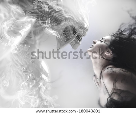 beauty and the beast, beautiful woman kissing a monster
