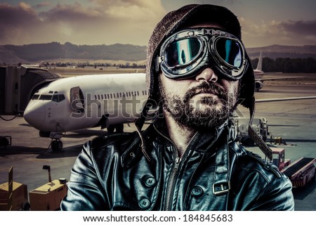 Pride pilot with black leather jacket and old glasses