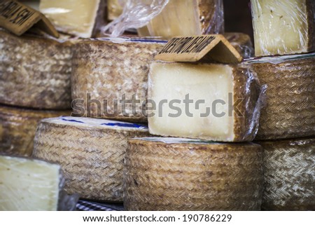 batch of cheese in a medieval fair, artisan cheese