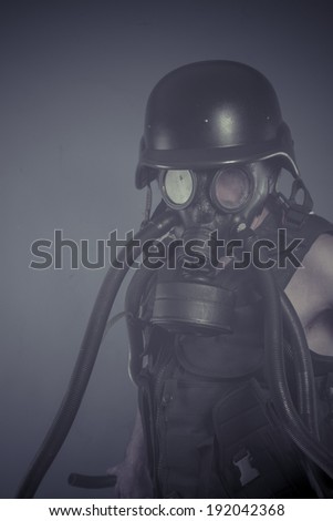 Radiation, Man with black gas mask, pollution concept and ecological disaster