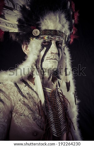 American Indian chief with big feather headdress