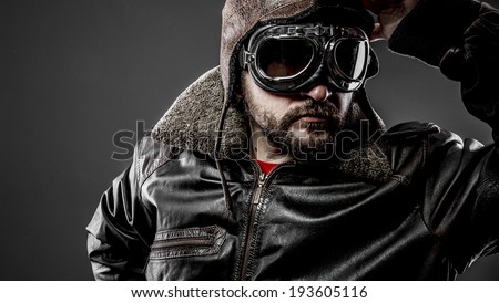 Man pilot cap and goggles motorcycle vintage style