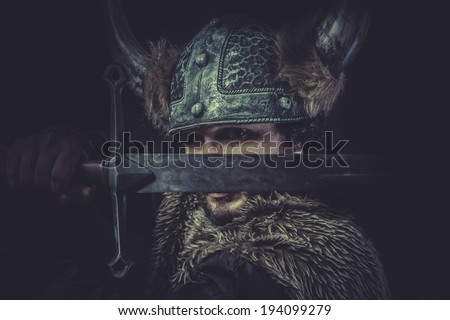 Leadership, Viking warrior with a huge sword and helmet with horns