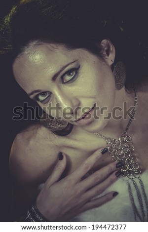 Egypt, brunette woman with gold and silver jewelry