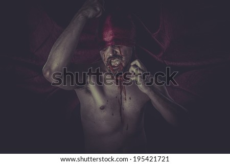 vampire with big teeth and blood in the neck