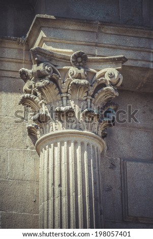 Rock, Corinthian capitals, stone columns in old building in Spain