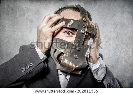 terror, business man with iron mask