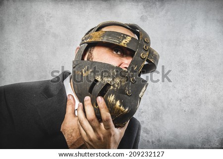 stress, dangerous business man with iron mask and expressions