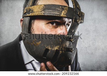 fury, dangerous business man with iron mask and expressions