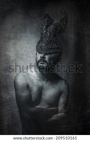 depression, man with golden helmet horns concept nightmares
