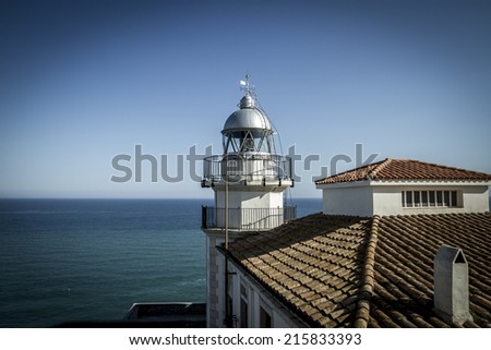Light house, Tourism, spanish landscape with deep blue sea andmediterranean  architecture
