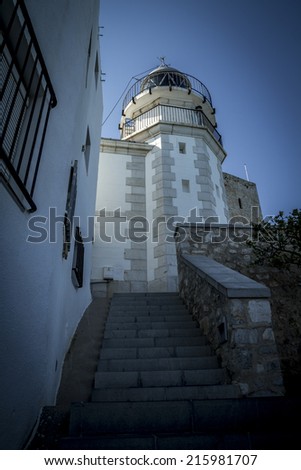 Light house, Tourism, spanish landscape with deep blue sea andmediterranean  architecture