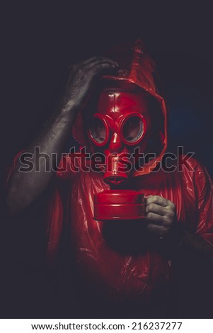 survival nuclear concept, man with red gas mask