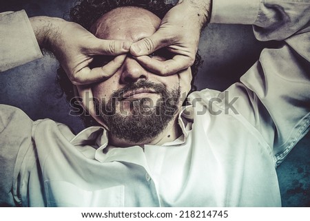 Chief, hands as a mask, man in white shirt with funny expressions