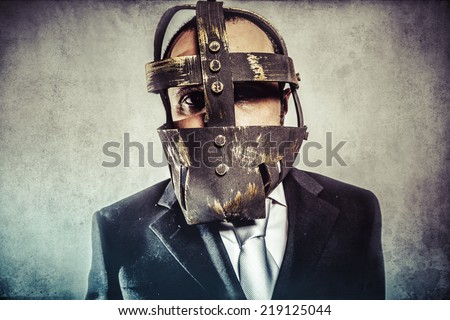 dangerous business man with iron mask and expressions