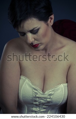 Sensual brunette woman in white lingerie
