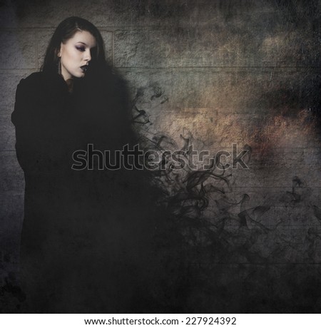 Gothic young with long black cape, fantasy