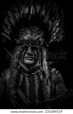 traditional Native, American Indian chief with big feather headdress