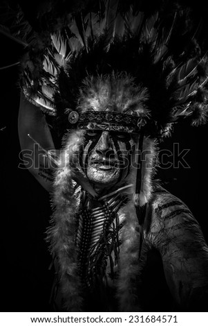 traditional Native, American Indian chief with big feather headdress