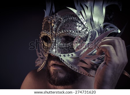 Mystery and Renaissance, adult man with mask silver and precious stones