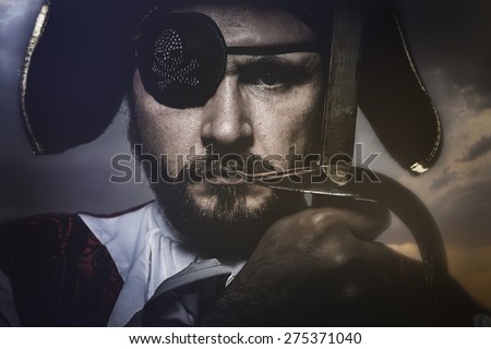 pirate with hat and eye patch holding a sword