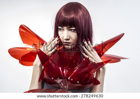 Cosplay, Japanese woman in costume of red plastic, modern and future concept