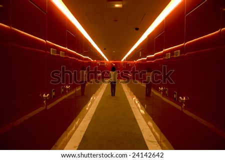 Red corridor, alone concept with girl