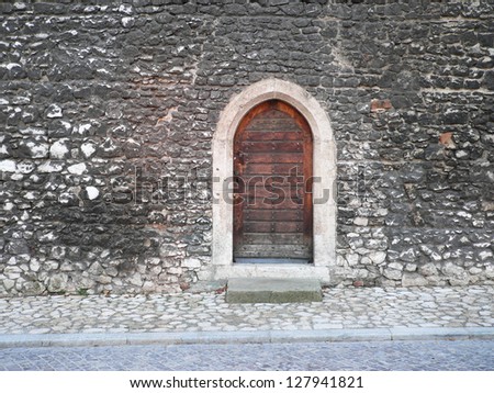 Old armored doorway. Back door to Wawel Castle in Krakow.