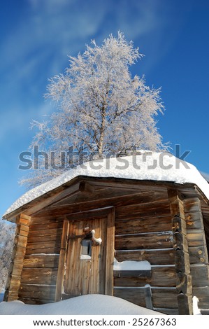 winter cottage where men have lived and worked
