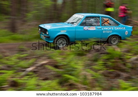 MALLOW, IRELAND - MAY 19: L. Lynch driving Ford Escort at the Jim Walsh Cork Forest Rally on May 19, 2012 in Mallow, Ireland. 4th round of the Valvoline National Forest Rally Championship.