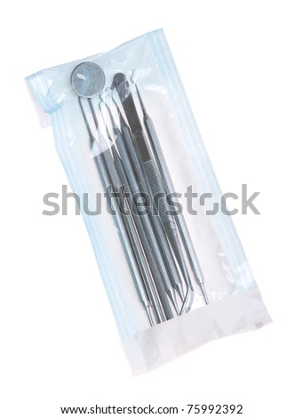 dentistry start kit in a sterilized pouch (isolated on white background)