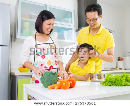 Asian family in the kitchen