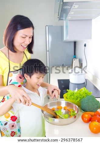 Asian family cooking in the kitchen