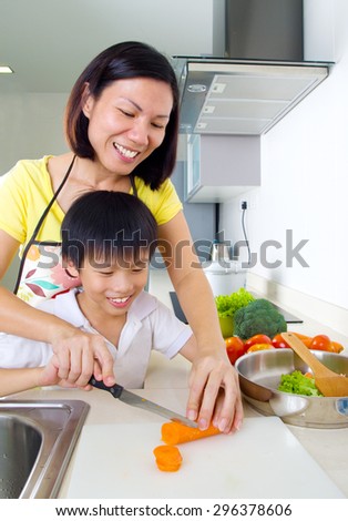 Asian family cooking in the kitchen