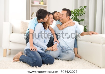 Indoor portrait of asian mixed race family