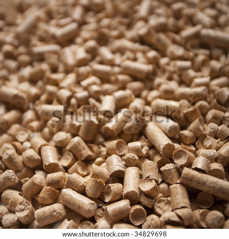 Wood pellets close-up texture background